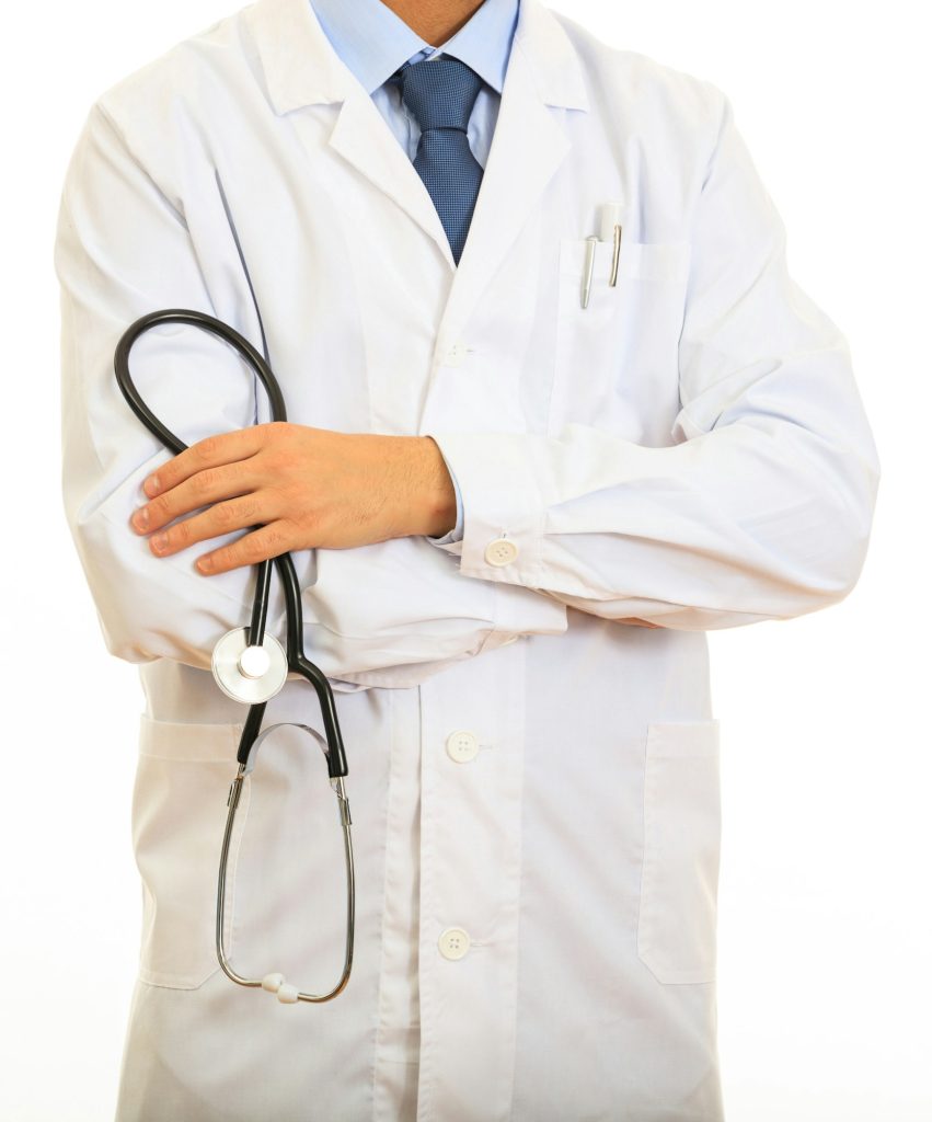 Doctor holding a stethoscope isolated on white